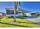 Front view of the house with landscaping at 1742 Fox Hill Dr, Lakeland, FL 33810