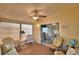 Sunroom featuring wicker chairs, a globe, and access to the living room at 1742 Fox Hill Dr, Lakeland, FL 33810