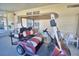 Golf cart parked on covered patio at 1742 Fox Hill Dr, Lakeland, FL 33810