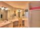 Bathroom with vanity, sink, and shower at 1742 Fox Hill Dr, Lakeland, FL 33810