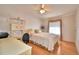 Bright bedroom with a ceiling fan and wood floors at 1742 Fox Hill Dr, Lakeland, FL 33810