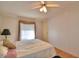 Spacious bedroom with large window and ceiling fan at 1742 Fox Hill Dr, Lakeland, FL 33810