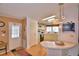 Kitchen with light cabinets, wood floors, and a breakfast bar at 1742 Fox Hill Dr, Lakeland, FL 33810