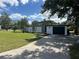 Mid-century modern home with a large front yard at 2128 Sycamore Dr, Winter Park, FL 32789