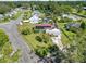 House with solar panels, aerial view at 1220 Woodland Ave, Lakeland, FL 33801