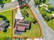 House and yard with solar panels, aerial view at 1220 Woodland Ave, Lakeland, FL 33801