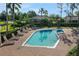 Relaxing pool area with multiple pools and lounge chairs at 109 Costa Loop, Auburndale, FL 33823