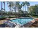 Inviting community pool with lounge chairs at 109 Costa Loop, Auburndale, FL 33823