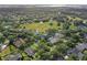 Aerial view of a neighborhood with houses and green spaces at 109 Costa Loop, Auburndale, FL 33823