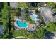 Aerial view of community pool and surrounding amenities at 109 Costa Loop, Auburndale, FL 33823