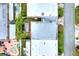 Aerial view of rooftops, backyard patios and lush greenery at 2203 Starboard Rd, Winter Haven, FL 33881