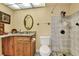 Bathroom with granite vanity, decorative tile shower and updated fixtures at 2203 Starboard Rd, Winter Haven, FL 33881