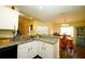 Bright kitchen with granite countertops and stainless steel appliances at 1015 Highland Crest Cir, Lake Wales, FL 33853