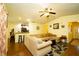 Open living room with a view of the kitchen and entryway at 1015 Highland Crest Cir, Lake Wales, FL 33853