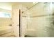 Updated bathroom with a large tiled shower and bathtub at 1015 Highland Crest Cir, Lake Wales, FL 33853