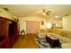 Spacious living room with sectional sofa and wood flooring at 1015 Highland Crest Cir, Lake Wales, FL 33853