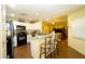 Modern kitchen with black appliances and granite counters at 1015 Highland Crest Cir, Lake Wales, FL 33853
