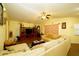 Spacious living room featuring a sectional sofa and hardwood floors at 1015 Highland Crest Cir, Lake Wales, FL 33853