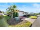 Single-story home with attached garage and landscaped yard at 4904 Goldenview Ln, Lakeland, FL 33811