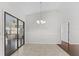 Dining area with tile floor and sliding glass doors to patio at 4904 Goldenview Ln, Lakeland, FL 33811