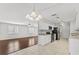 Open kitchen with stainless steel appliances and breakfast bar at 4904 Goldenview Ln, Lakeland, FL 33811