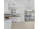 Modern kitchen with white cabinets, granite counters, and stainless steel appliances at 4904 Goldenview Ln, Lakeland, FL 33811