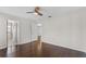 Bedroom with wood flooring and access to another bedroom and bathroom at 4904 Goldenview Ln, Lakeland, FL 33811