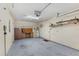 Organized garage with workbench, storage shelves, and a water heater at 4904 Goldenview Ln, Lakeland, FL 33811