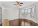 Bright bedroom featuring wood-look flooring and a bay window at 4904 Goldenview Ln, Lakeland, FL 33811