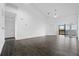 Spacious living room with dark wood floors at 1710 Garden Lake Dr # 1710, Winter Haven, FL 33884