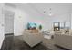 Living room with staged furniture and view at 1710 Garden Lake Dr # 1710, Winter Haven, FL 33884