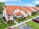 Aerial view of condo community with lake access at 1710 Garden Lake Dr # 1710, Winter Haven, FL 33884