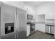 Modern kitchen with stainless steel appliances and granite countertops at 1710 Garden Lake Dr # 1710, Winter Haven, FL 33884