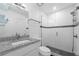 Clean bathroom with granite countertop, a large shower, and modern fixtures at 1710 Garden Lake Dr # 1710, Winter Haven, FL 33884