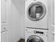 Convenient laundry closet with a stackable washer and dryer at 1710 Garden Lake Dr # 1710, Winter Haven, FL 33884