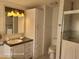 Bathroom with a toilet, sink, and shower at 1744 Quail Hill Dr, Lakeland, FL 33810