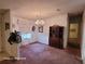 Formal dining room with a lovely chandelier and built-in hutch at 1744 Quail Hill Dr, Lakeland, FL 33810