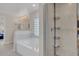 Bathroom featuring a walk-in shower and a separate tub at 258 Padgett Pl S, Lakeland, FL 33809