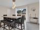 Bright dining room with a marble top table and six chairs at 258 Padgett Pl S, Lakeland, FL 33809