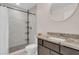 Clean bathroom with granite countertop, shower, and updated fixtures at 258 Padgett Pl S, Lakeland, FL 33809