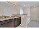 Bathroom with double sinks, granite countertop and a soaking tub at 258 Padgett Pl S, Lakeland, FL 33809