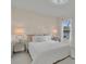 Bedroom with a king-size bed and stylish nightstands at 258 Padgett Pl S, Lakeland, FL 33809