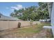 Large backyard with a wooden fence at 258 Padgett Pl S, Lakeland, FL 33809