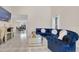 Spacious living room with sectional sofa and large TV at 258 Padgett Pl S, Lakeland, FL 33809