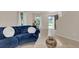 Living room with sectional sofa and view to entryway at 258 Padgett Pl S, Lakeland, FL 33809