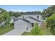 Two-story house with gray siding and stone accents at 258 Padgett Pl S, Lakeland, FL 33809