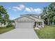 Two-story house with gray siding and stone accents at 258 Padgett Pl S, Lakeland, FL 33809