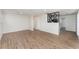 Open living space with room divider and wood-look floors at 218 King Rd, Winter Haven, FL 33880