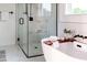Elegant bathroom with a freestanding bathtub and a glass shower at 1001 Cody Bluffs Rd, Babson Park, FL 33827