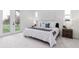 Main bedroom with plush carpet and backyard access at 1001 Cody Bluffs Rd, Babson Park, FL 33827